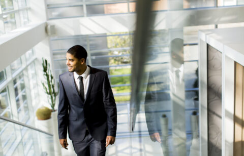 Handsome young black man on the stairs